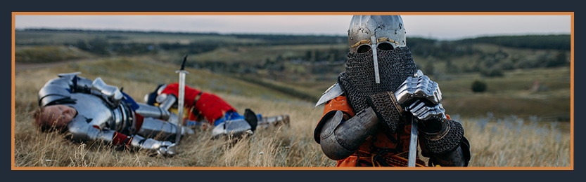 knight on the foreground sitting on a grassfield, and knight dead on the background